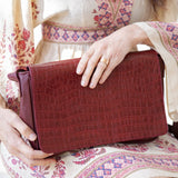 red leather handbag